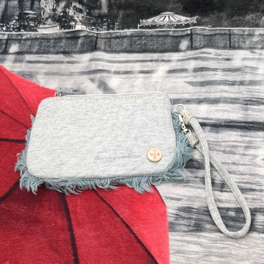 Fuzzy Nation charming wristlet